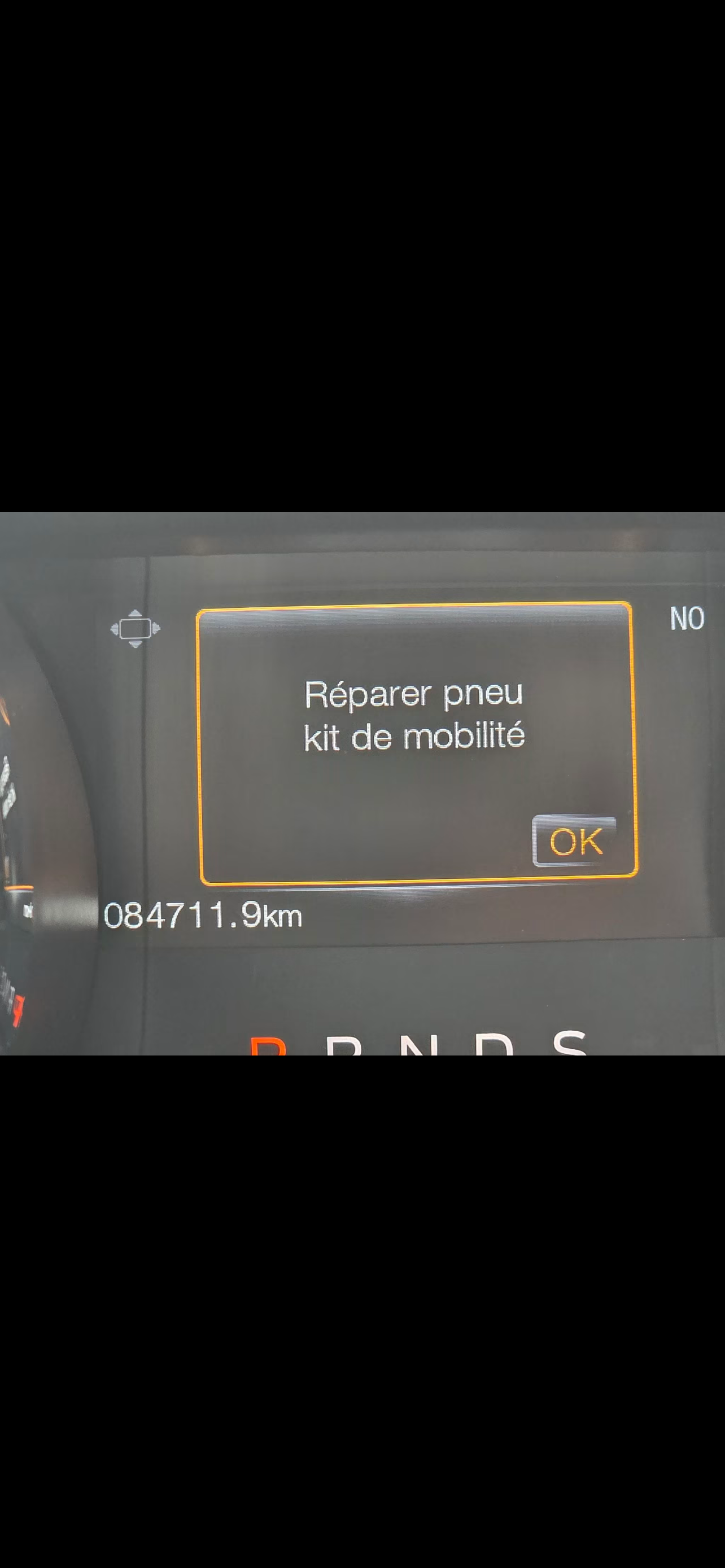 Combiné Ford : message Réparer pneu kit de mobilité, bouton OK